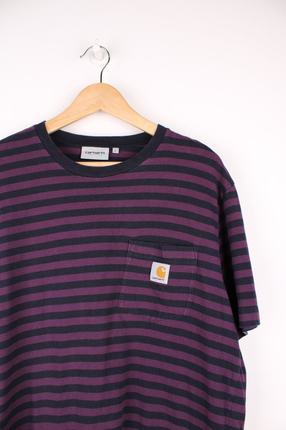 Carhartt WIP purple and black striped cotton t-shirt. Features signature logo on the chest pocket