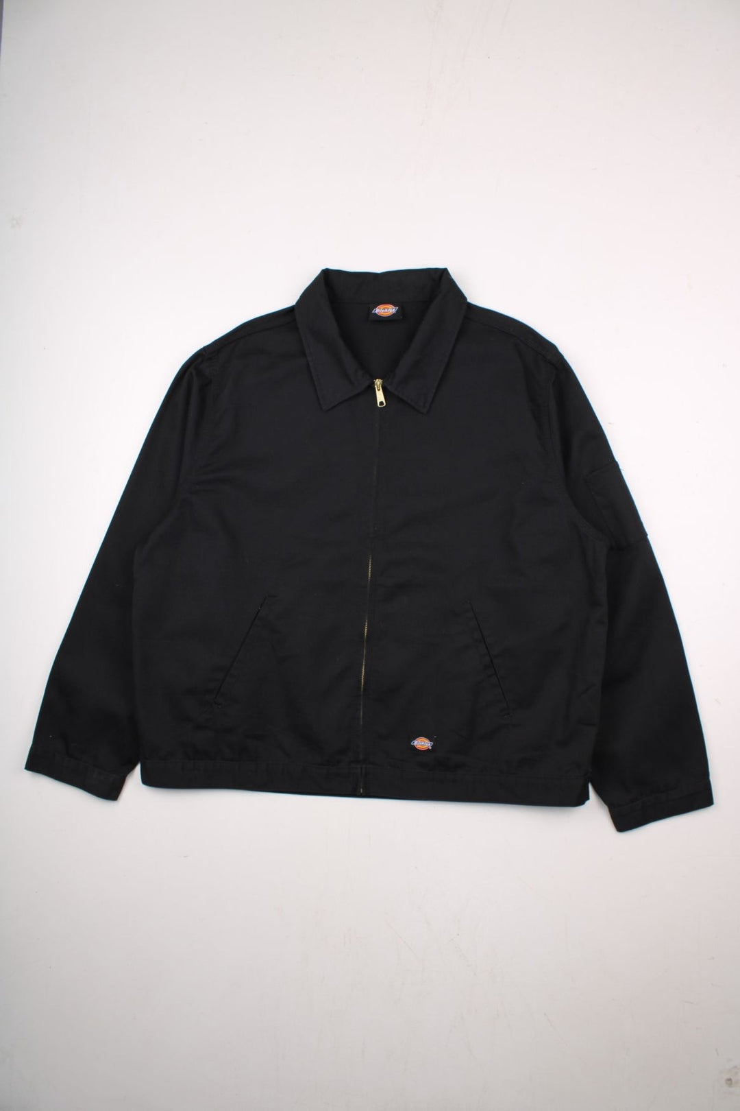 Dickies unlined Eisenhower jacket in black zip closure, multiple pockets, and a small logo patch on the front.