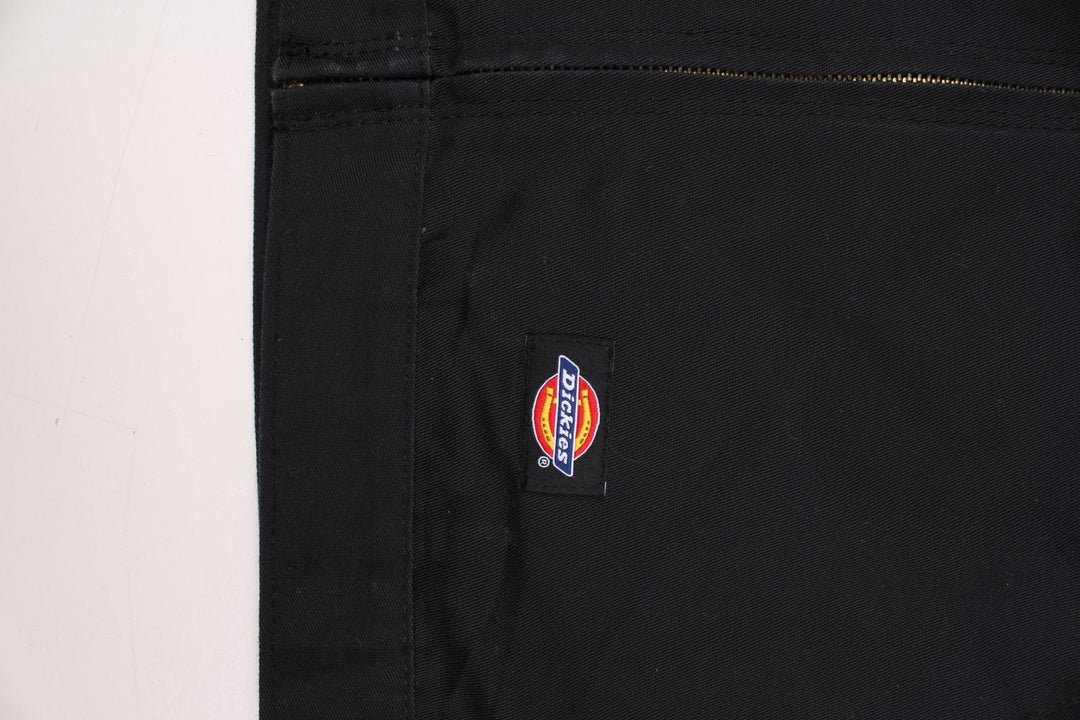 Dickies unlined Eisenhower jacket in black zip closure, multiple pockets, and a small logo patch on the front.