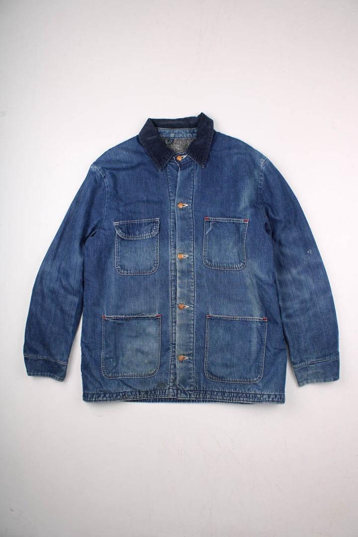 70s Wrangler denim chore jacket in blue - blanket-lined, with four patch pockets, button closure, and a corduroy collar.