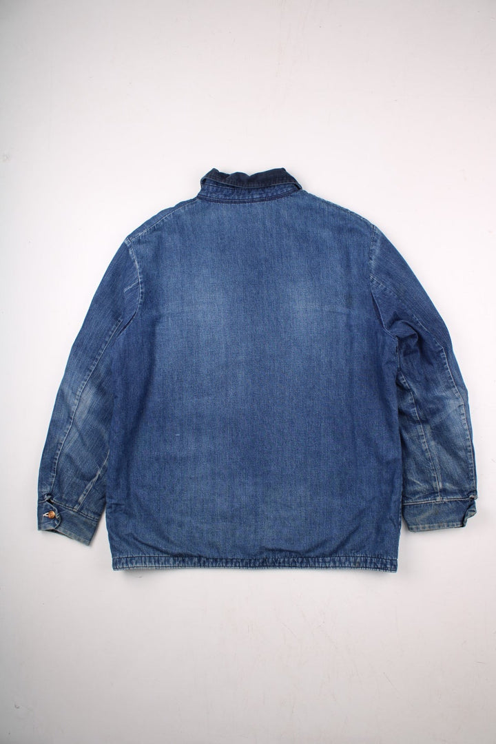 70s Wrangler denim chore jacket in blue - blanket-lined, with four patch pockets, button closure, and a corduroy collar.