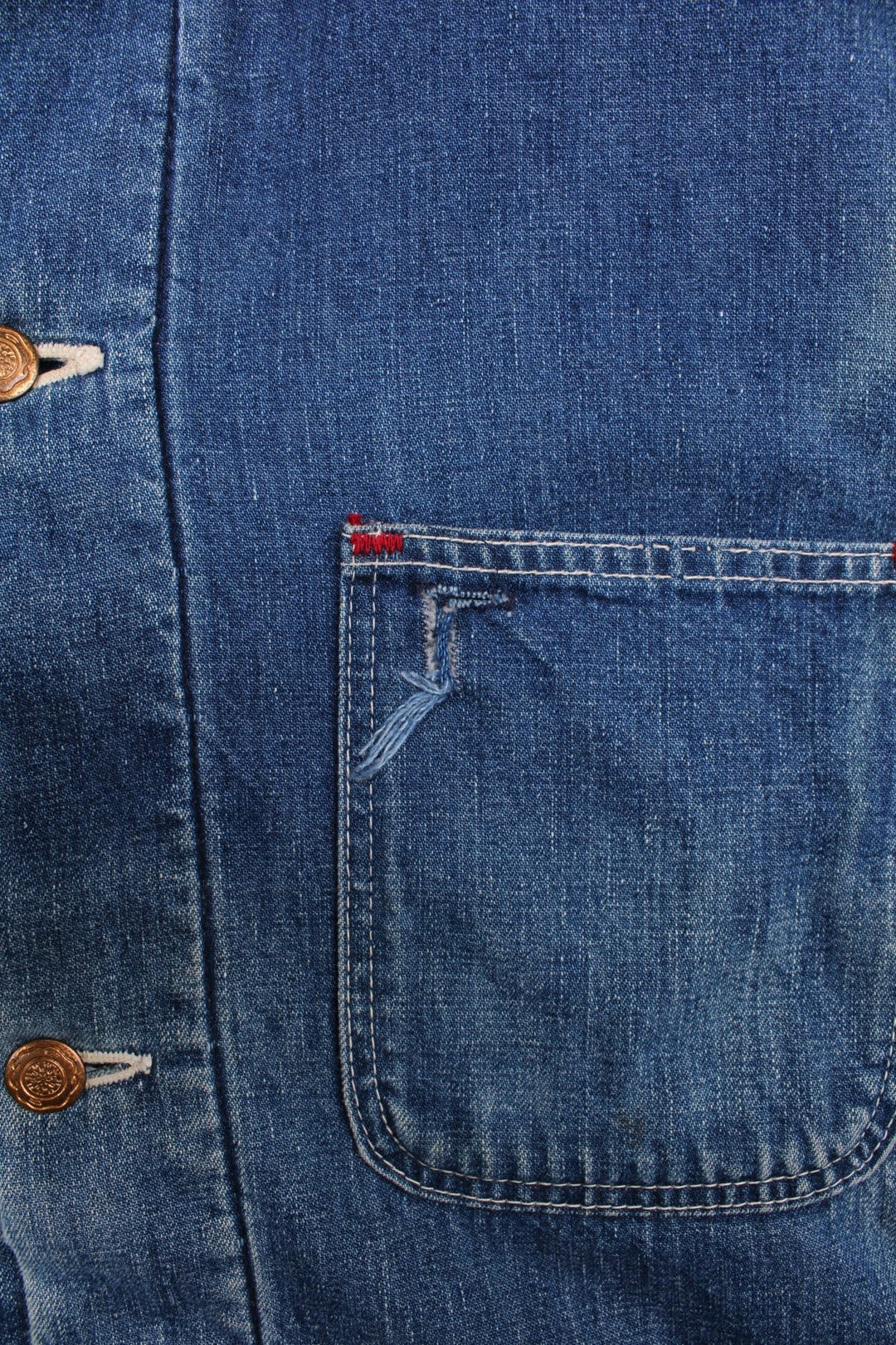 70s Wrangler denim chore jacket in blue - blanket-lined, with four patch pockets, button closure, and a corduroy collar.