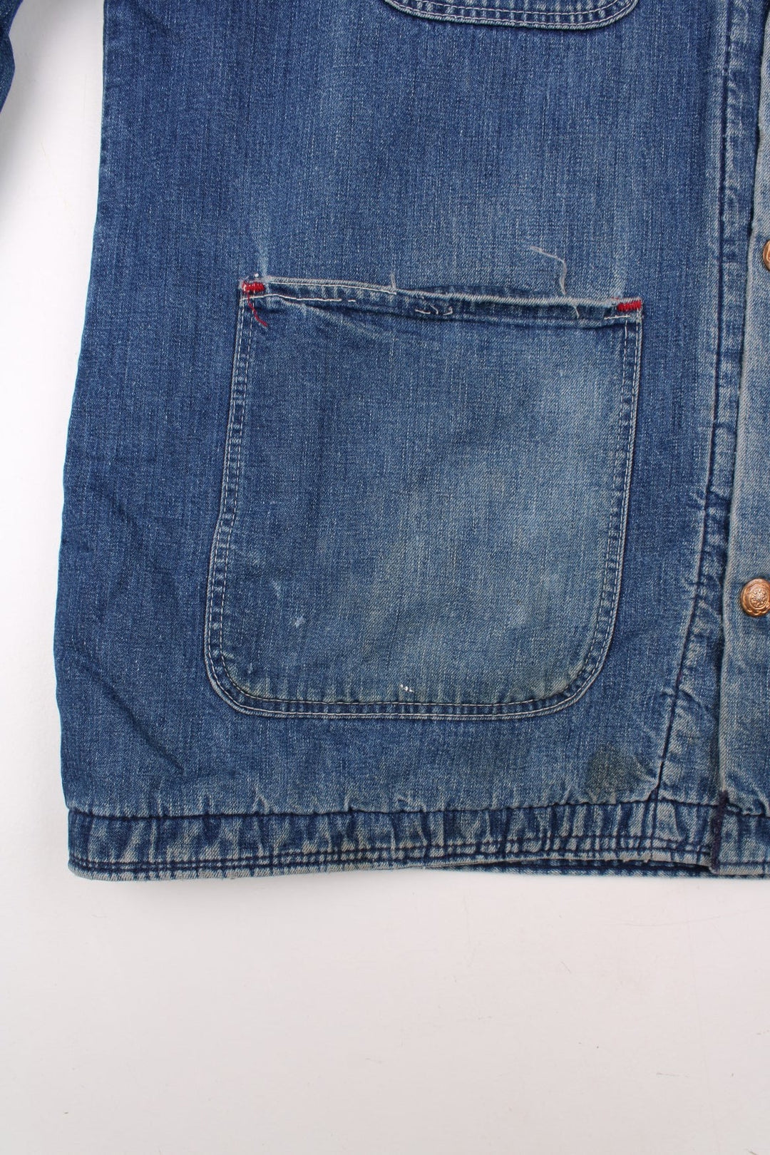 70s Wrangler denim chore jacket in blue - blanket-lined, with four patch pockets, button closure, and a corduroy collar.