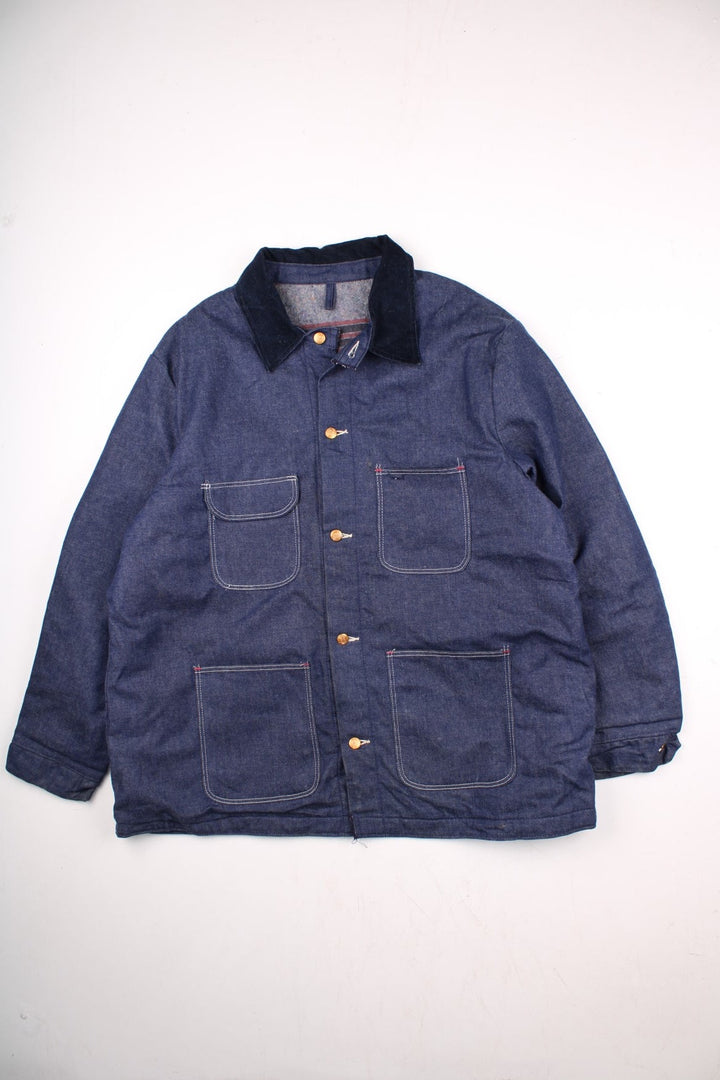 Vintage Blue Bell blanket lined denim chore jacket in indigo blue with four patch pockets, contrast stitching, and a corduroy collar.