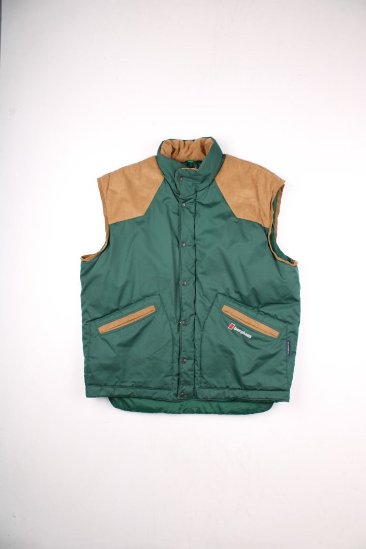 90s Berghaus 'Arctic Vest' gilet in green with tan faux suede detailing, zip and snap closure, two pockets, and an embroidered logo on the lower right side.