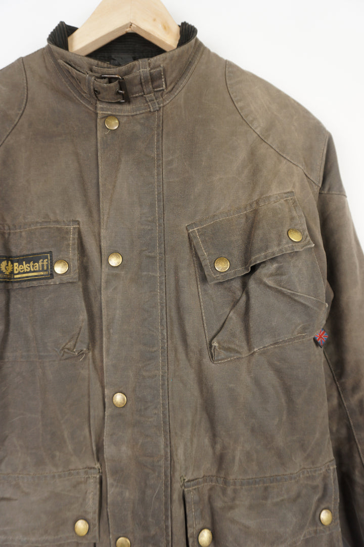 Women's Belstaff faded brown wax jacket with Belstaff logo on sleeve and pocket, plaid lining