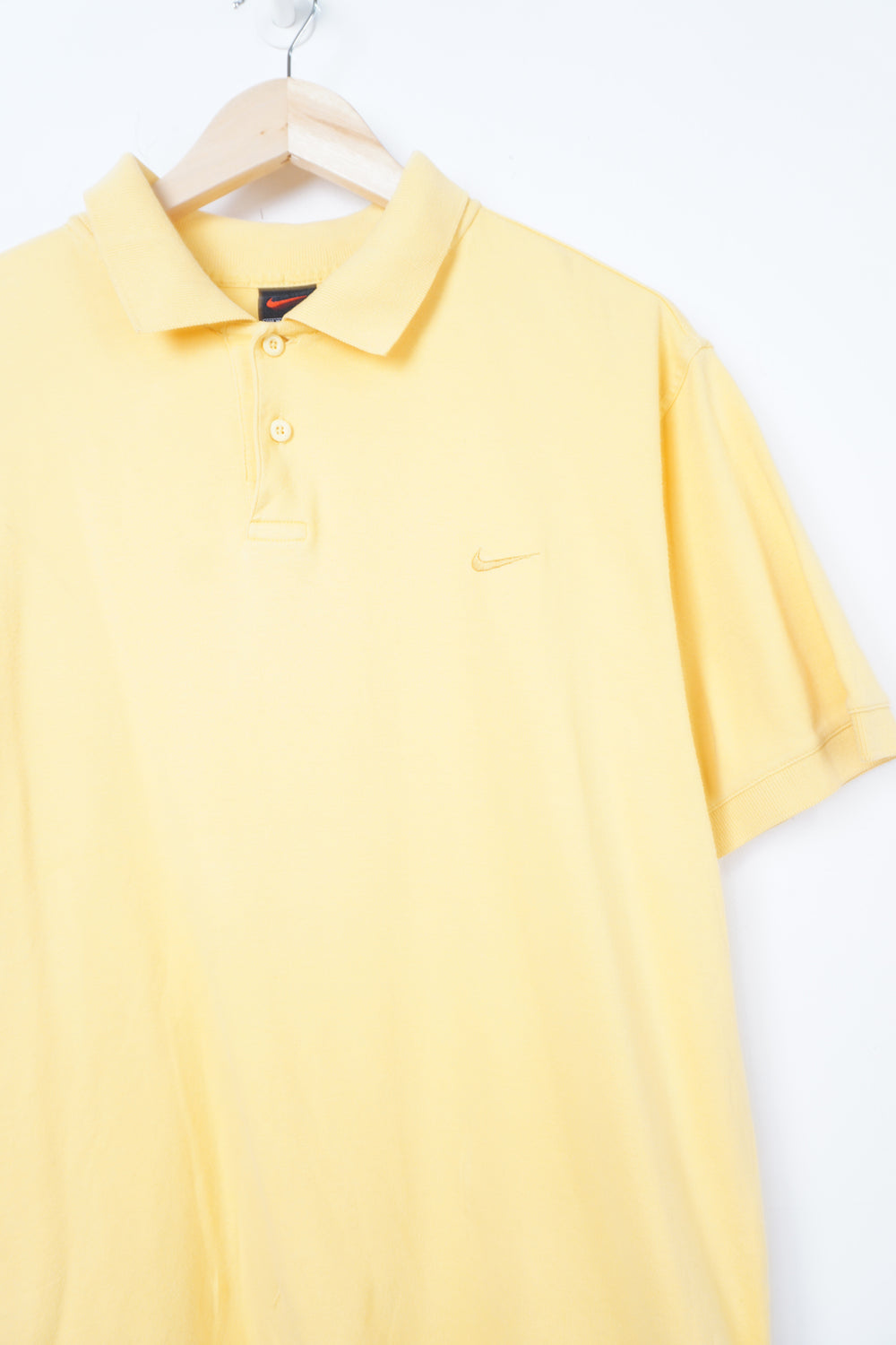 Late 90's Nike all yellow polo shirt with yellow embroidered swoosh logo on the chest 