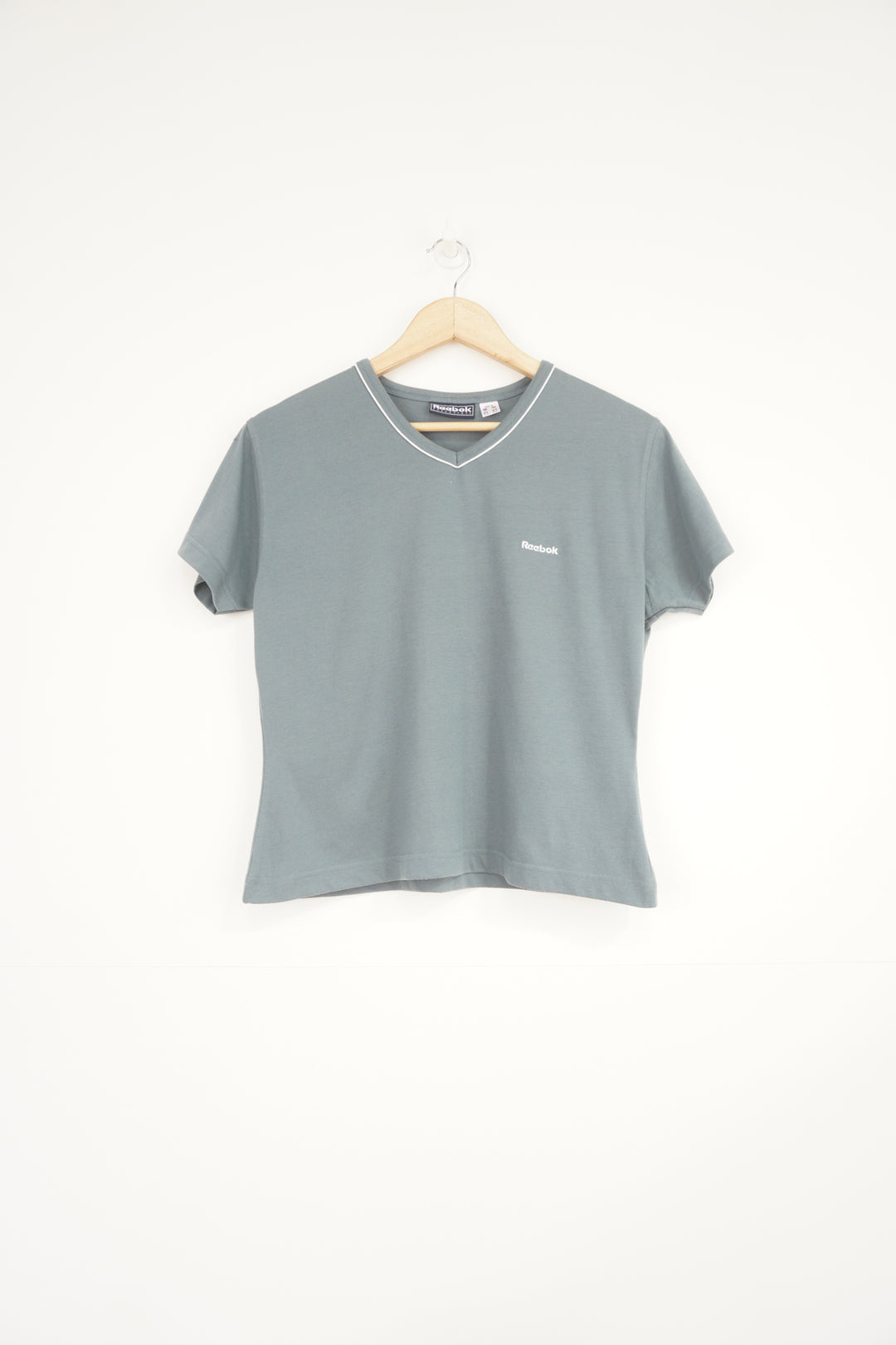 Teal blue almost grey Reebok v-neck t-shirt with embroidered logo on the chest