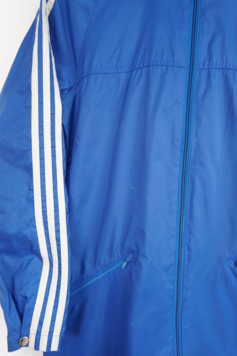 Vintage 90's Adidas blue lightweight windbreaker style jacket with embroidered logo and zip away hood