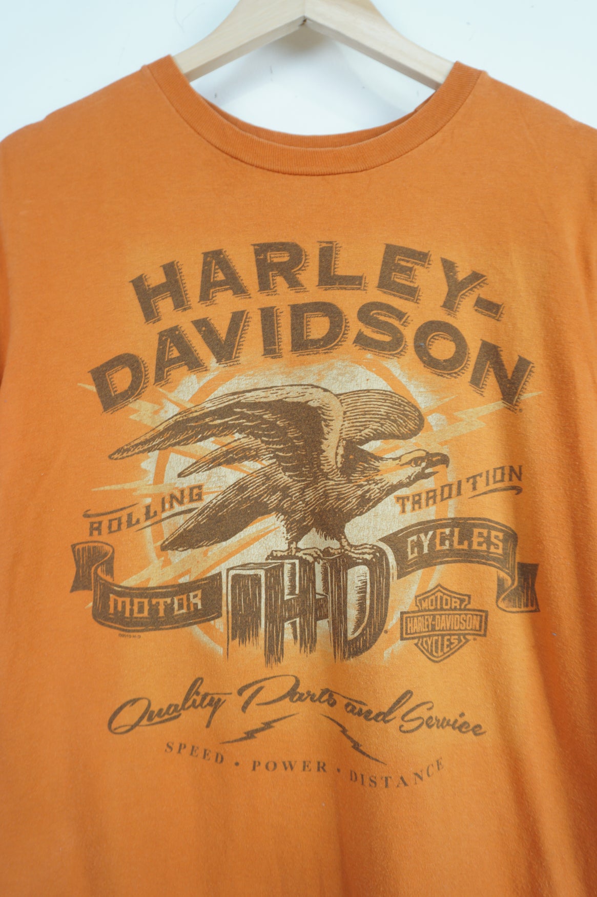 Harley Davidson orange t-shirt with spell-out and graphic on the front and back