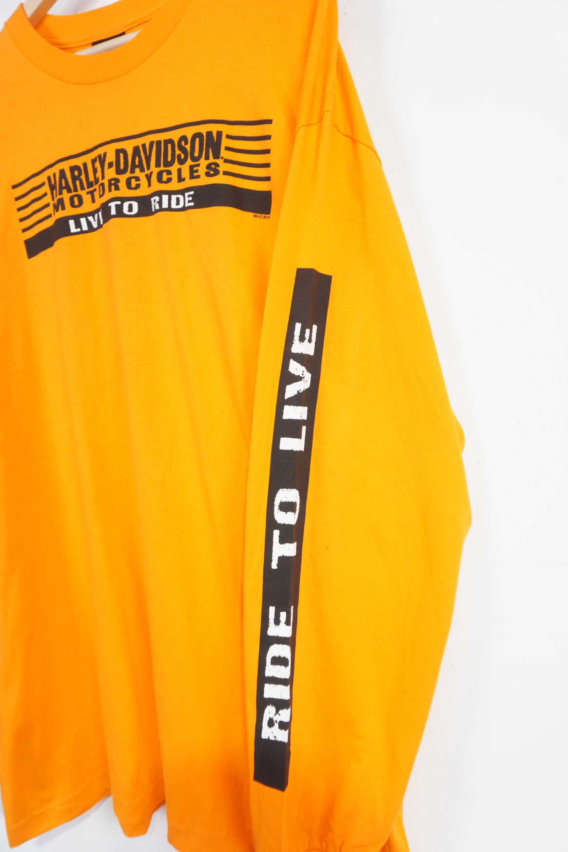 Harley Davidson orange long sleeve t-shirt with spell-out and graphic on the front and back