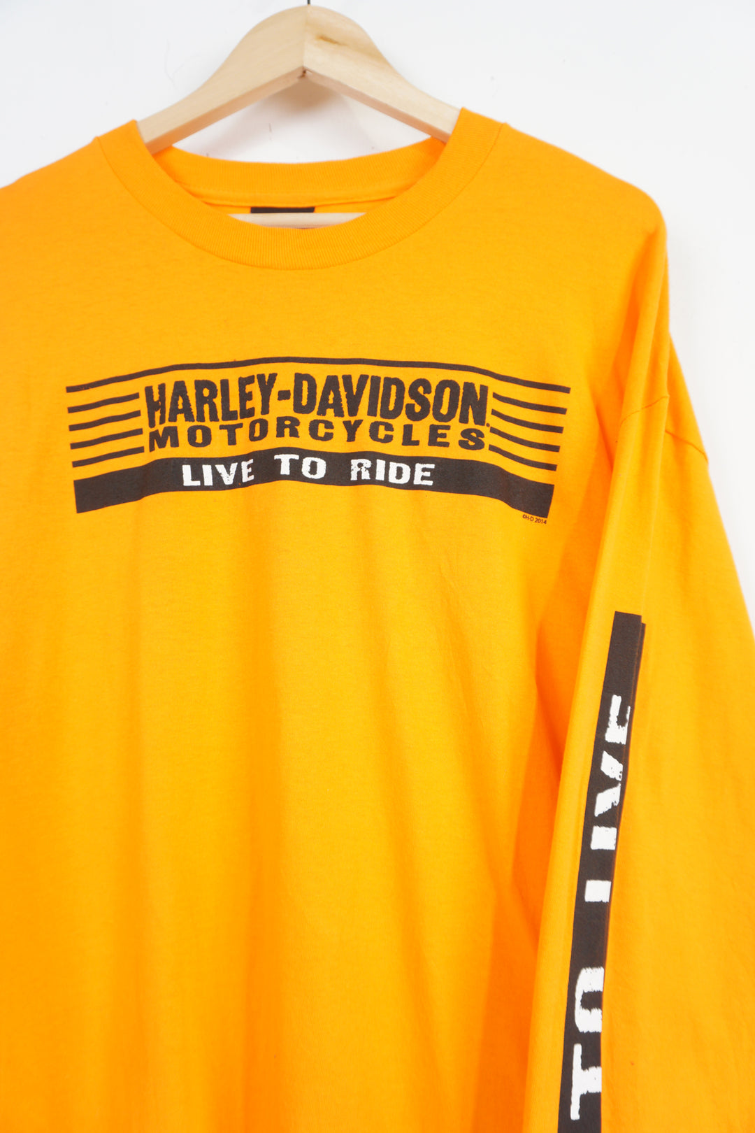 Harley Davidson orange long sleeve t-shirt with spell-out and graphic on the front and back