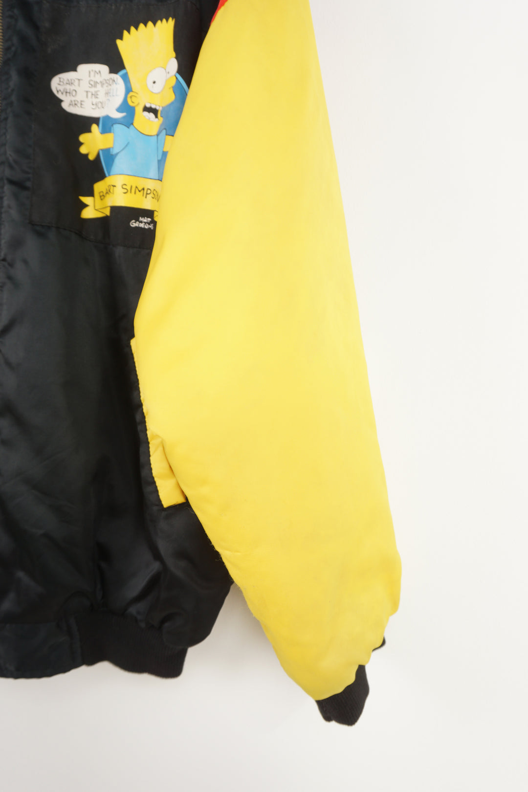 Vintage 90's The Simpsons theme child's bomber jacket with Bart Simpson graphics on the front and back