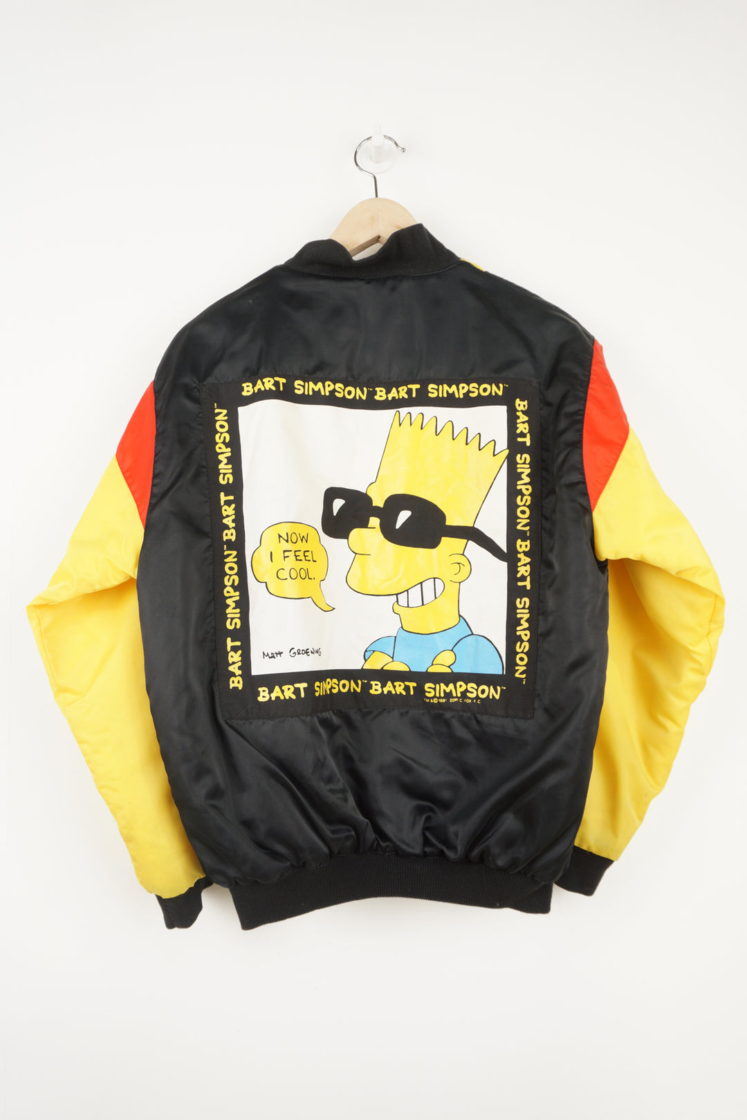 Vintage 90's The Simpsons theme child's bomber jacket with Bart Simpson graphics on the front and back