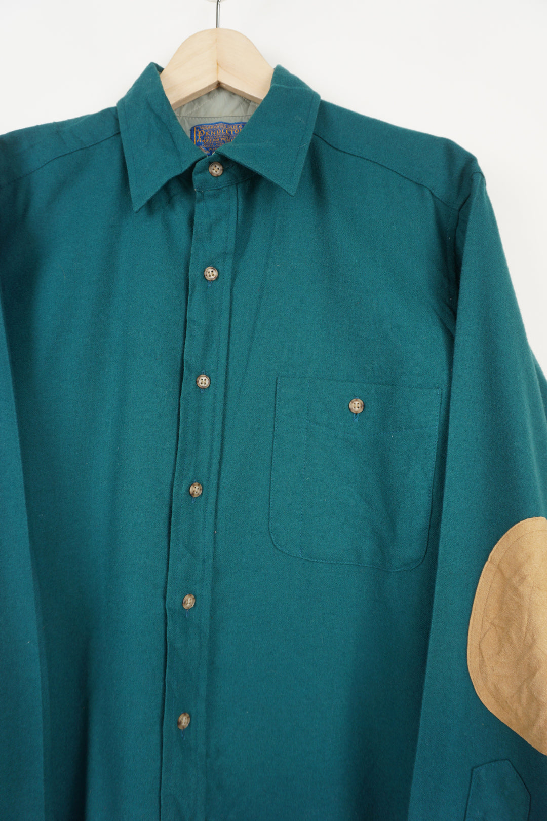 Vintage Pendleton teal green pure wool button up shirt with chest pocket and elbow patches