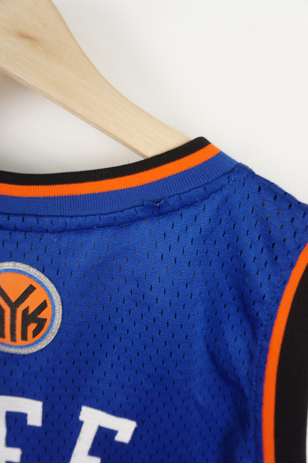 Blue and black New York Knicks David Lee #42 NBA swingman jersey by Adidas, with printed lettering