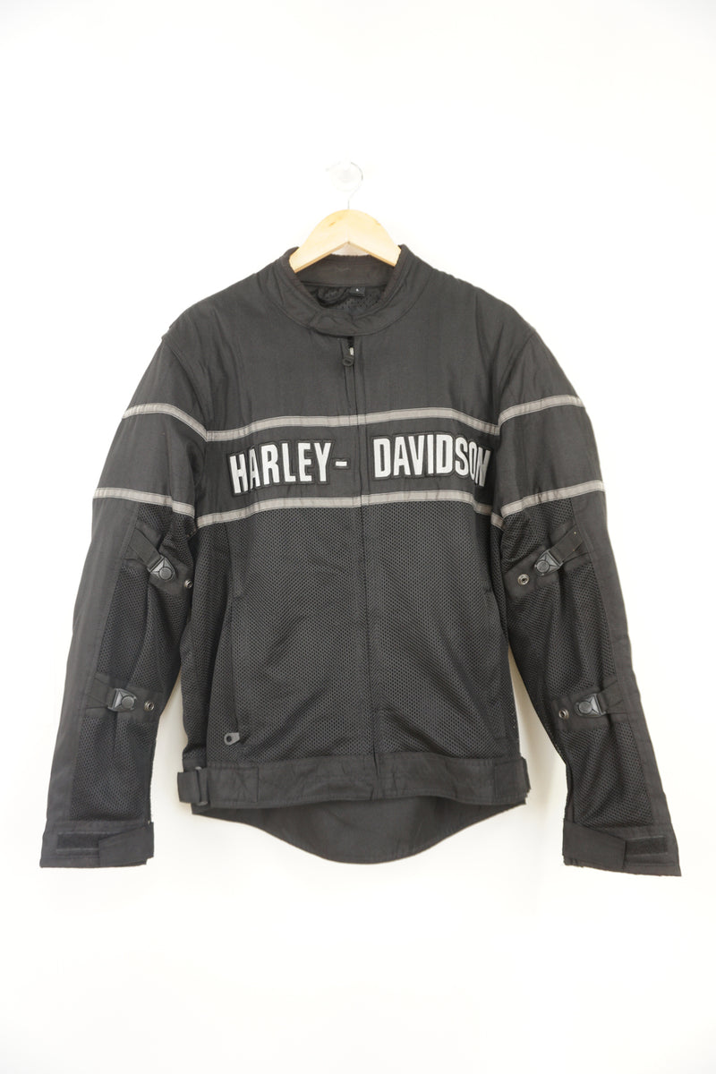 Harley Davidson classic cruiser black mesh riding jacket with removable pads in the shoulder and elbows. With embroidered spell-out details across the chest and on the back