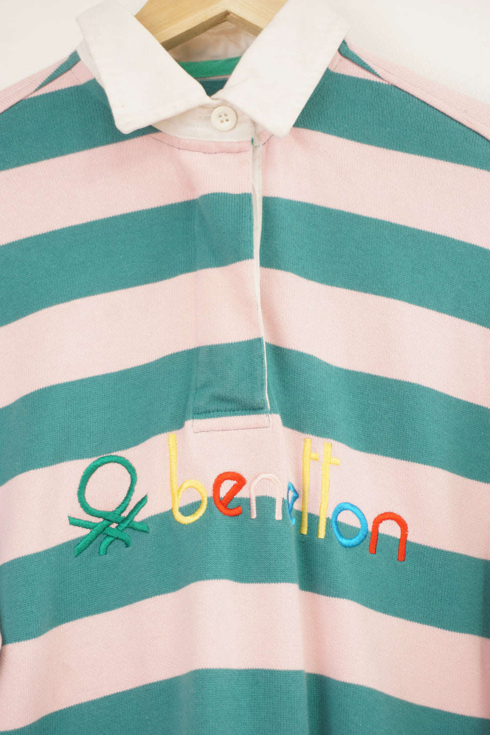 Vintage Benetton green and pink striped polo shirt with embroidered logo across the chest