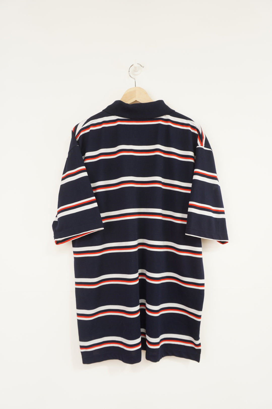 Vintage Coogi navy blue, striped polo shirt with embroidered logo on the chest