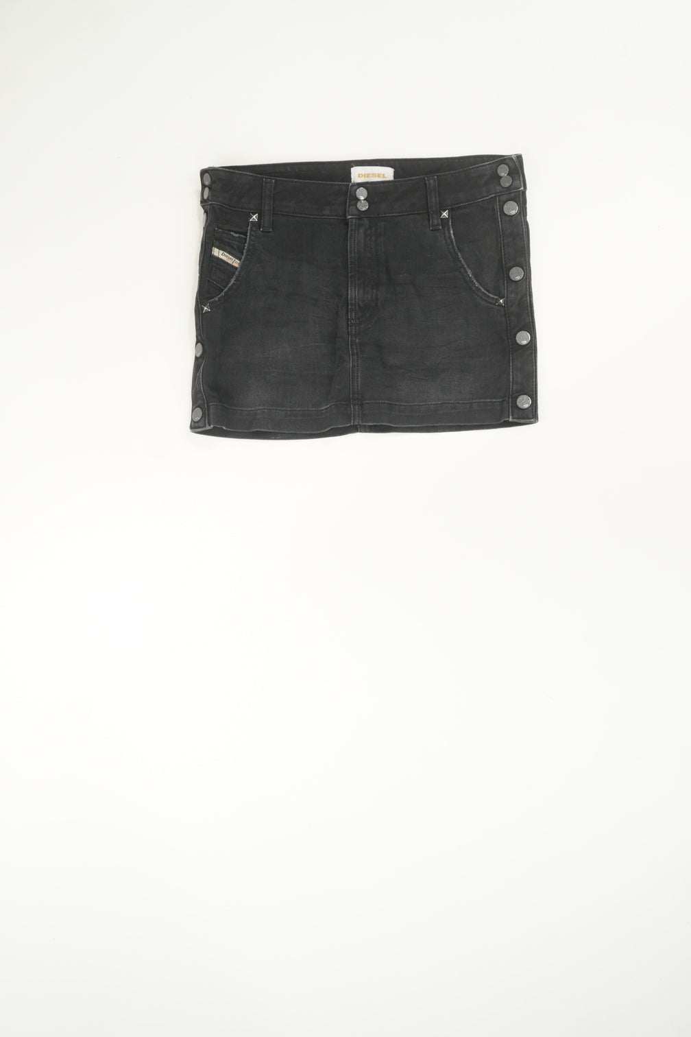 Vintage Y2K Diesel distressed black denim mini skirt with signature logo on the pocket