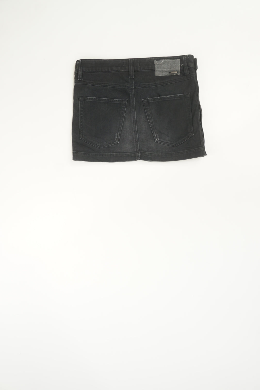 Vintage Y2K Diesel distressed black denim mini skirt with signature logo on the pocket