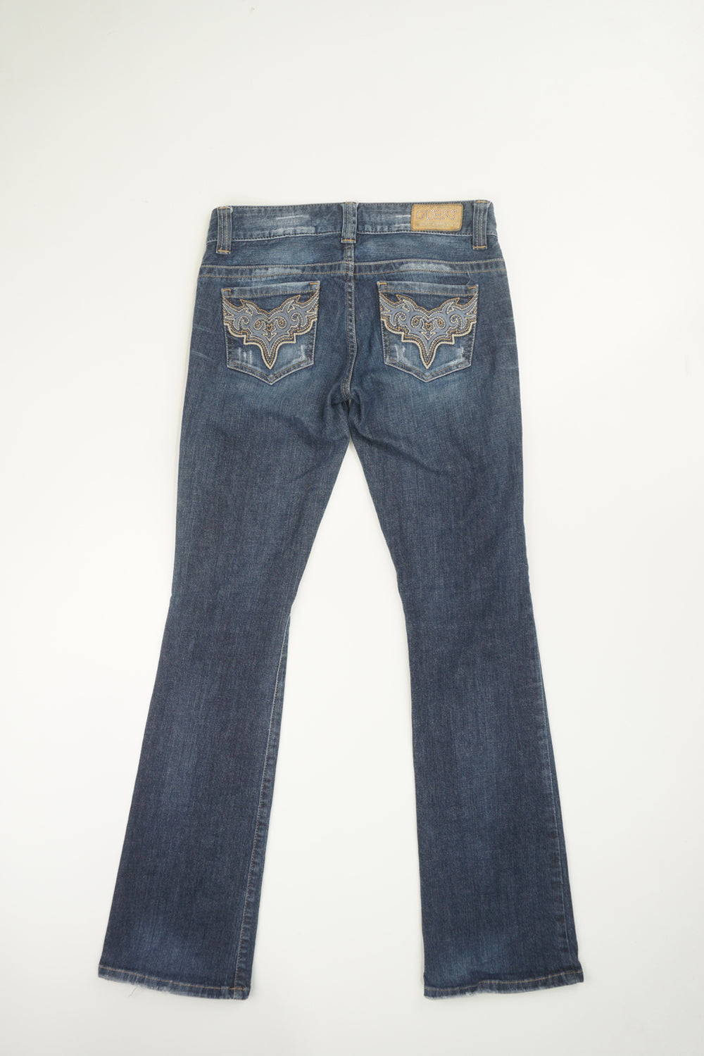 Y2K Guess distressed, slightly flared jeans with embroidered back pockets.