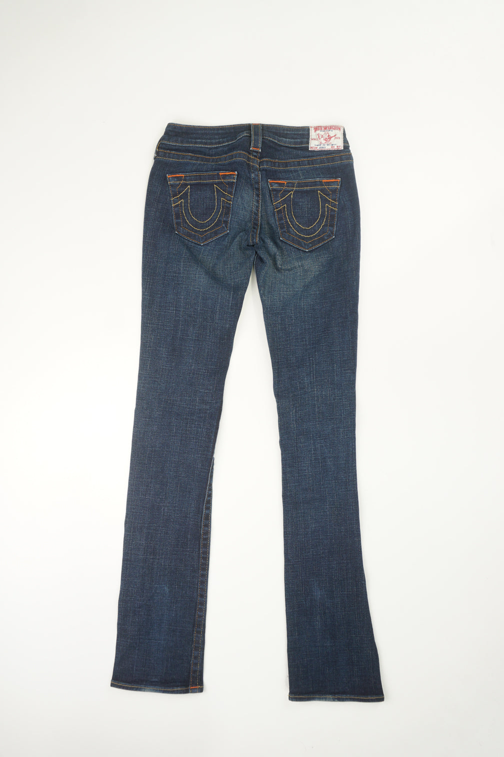 True Religion low rise, slim fit leg jeans with embroidered back pockets