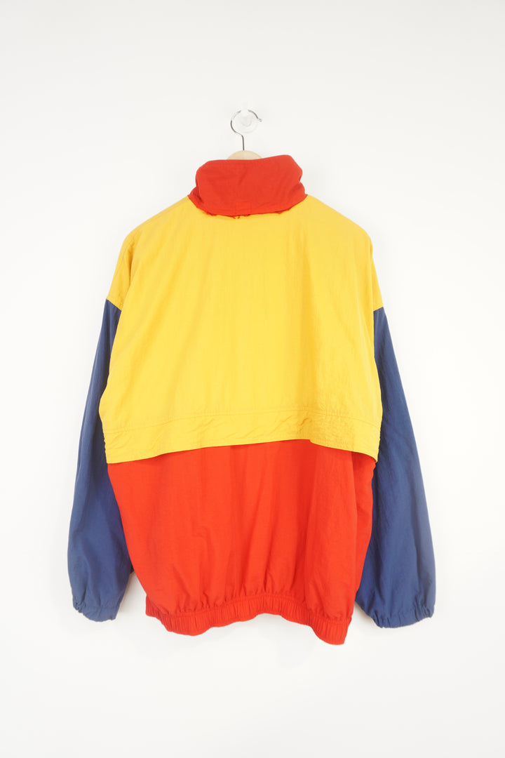 Vintage 1980's Puma red, blue and yellow colour block zip through tracksuit jacket with embroidered logo on the chest