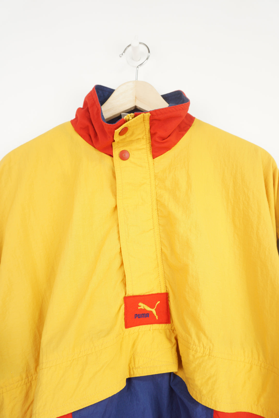 Vintage 1980's Puma red, blue and yellow colour block zip through tracksuit jacket with embroidered logo on the chest