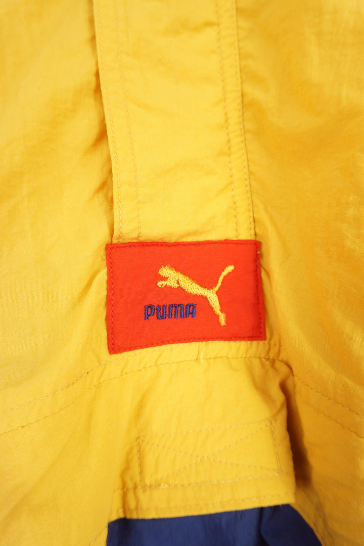 Vintage 1980's Puma red, blue and yellow colour block zip through tracksuit jacket with embroidered logo on the chest