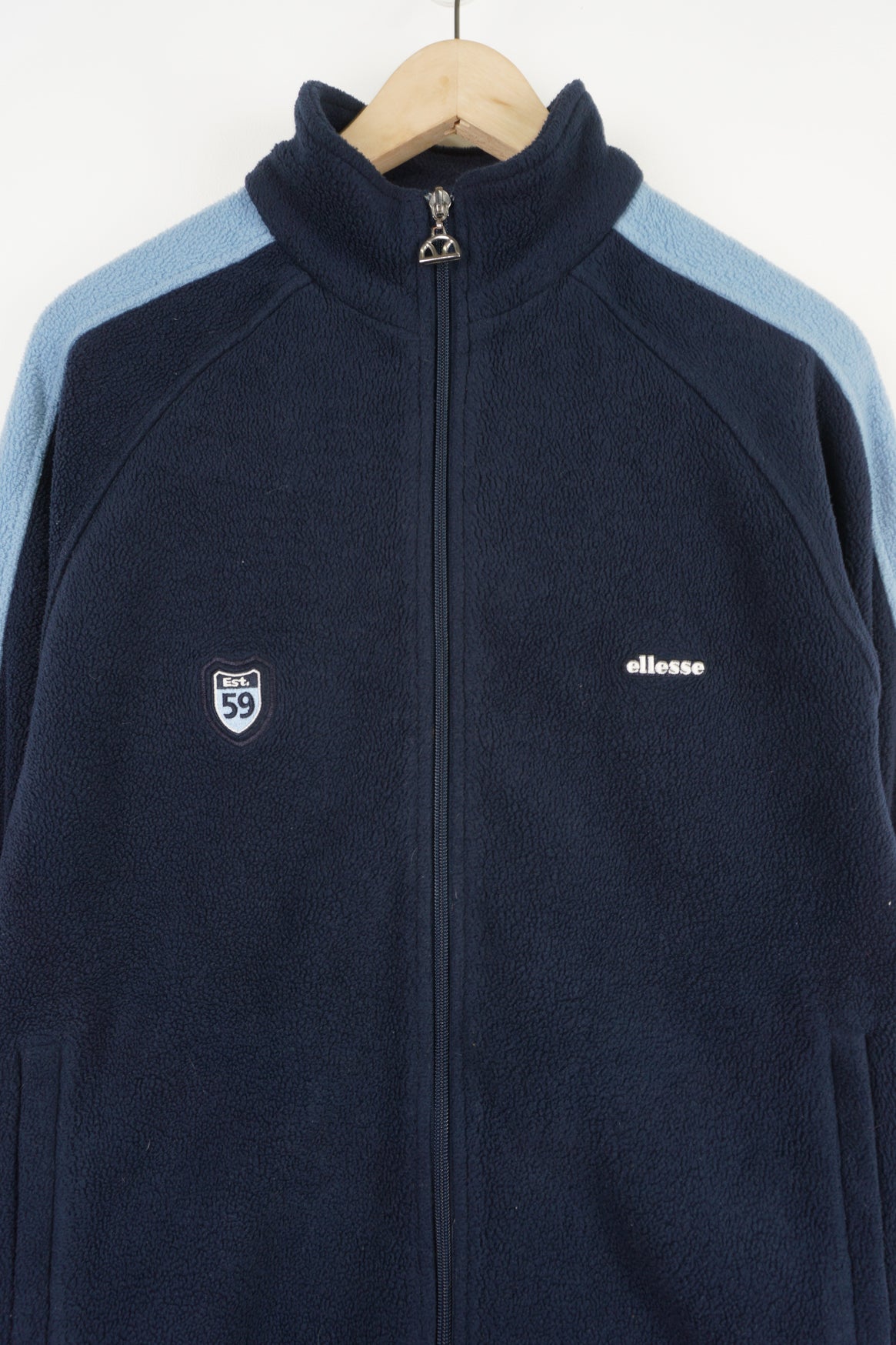 Vintage blue tone Ellesse zip through fleece with embroidered logo on the chest