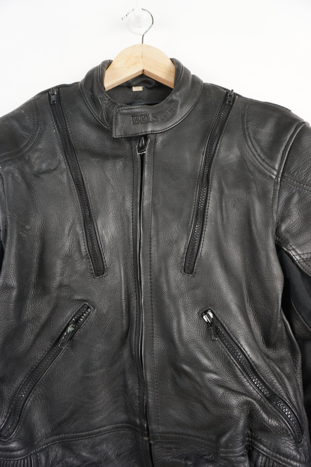 Belstaff Biker Motorcycle Jacket crafted from high quality black leather, it features embroidered Belstaff logos on both arms and classic black hardware. It has reliable zip and Velcro closure, as well as shoulder and elbow pads