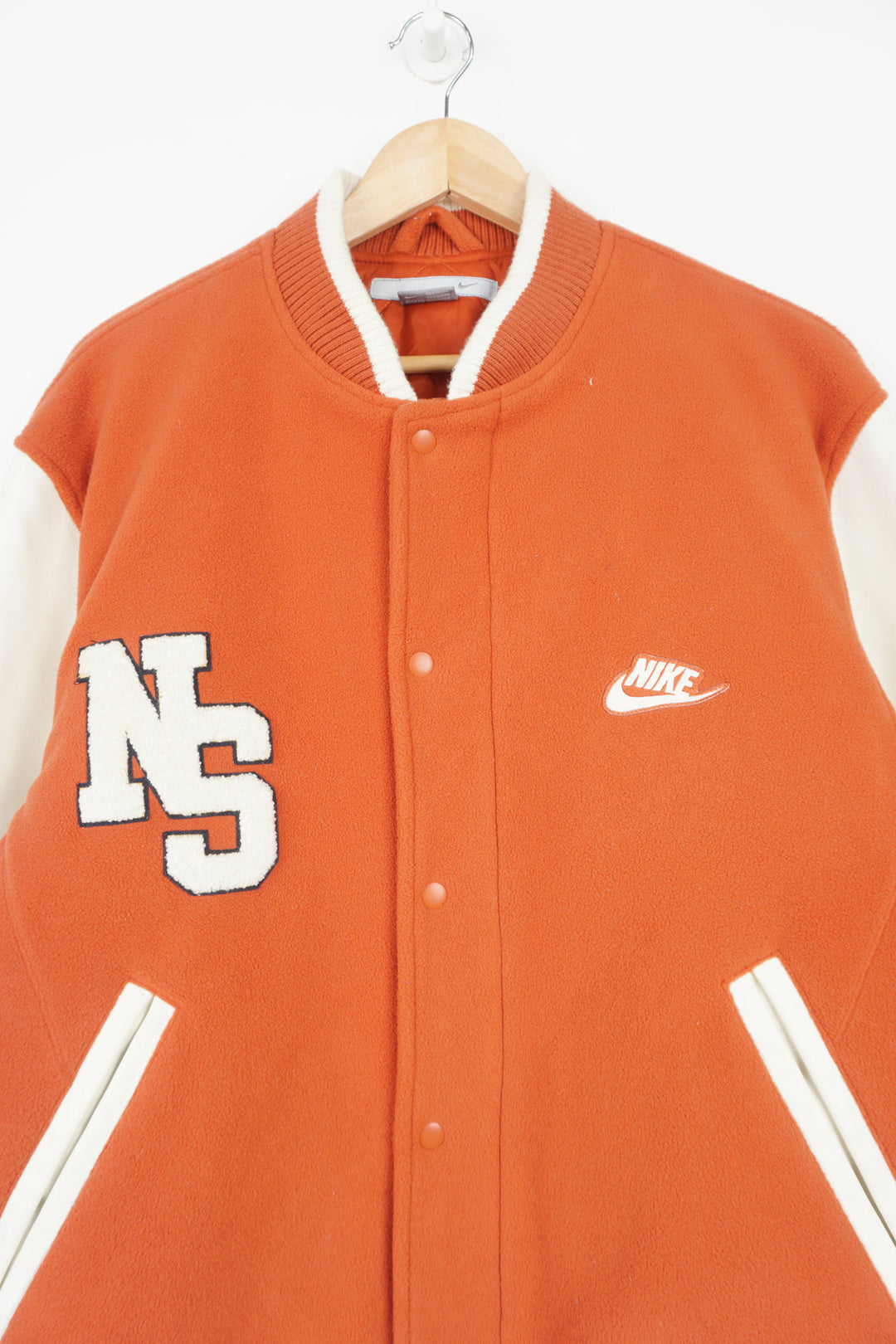 Vintage Nike Oregon orange and white fleece varsity jacket with leather sleeves and embroidered spell-out details