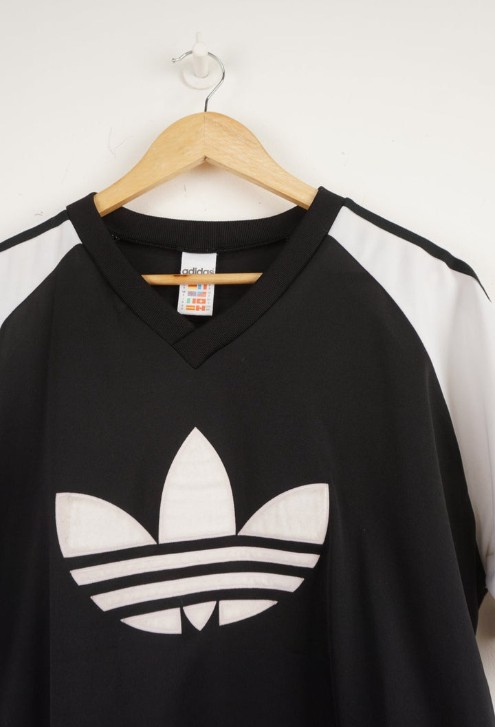 Vintage 90's Adidas v-neck black and white football top with raised logo on chest