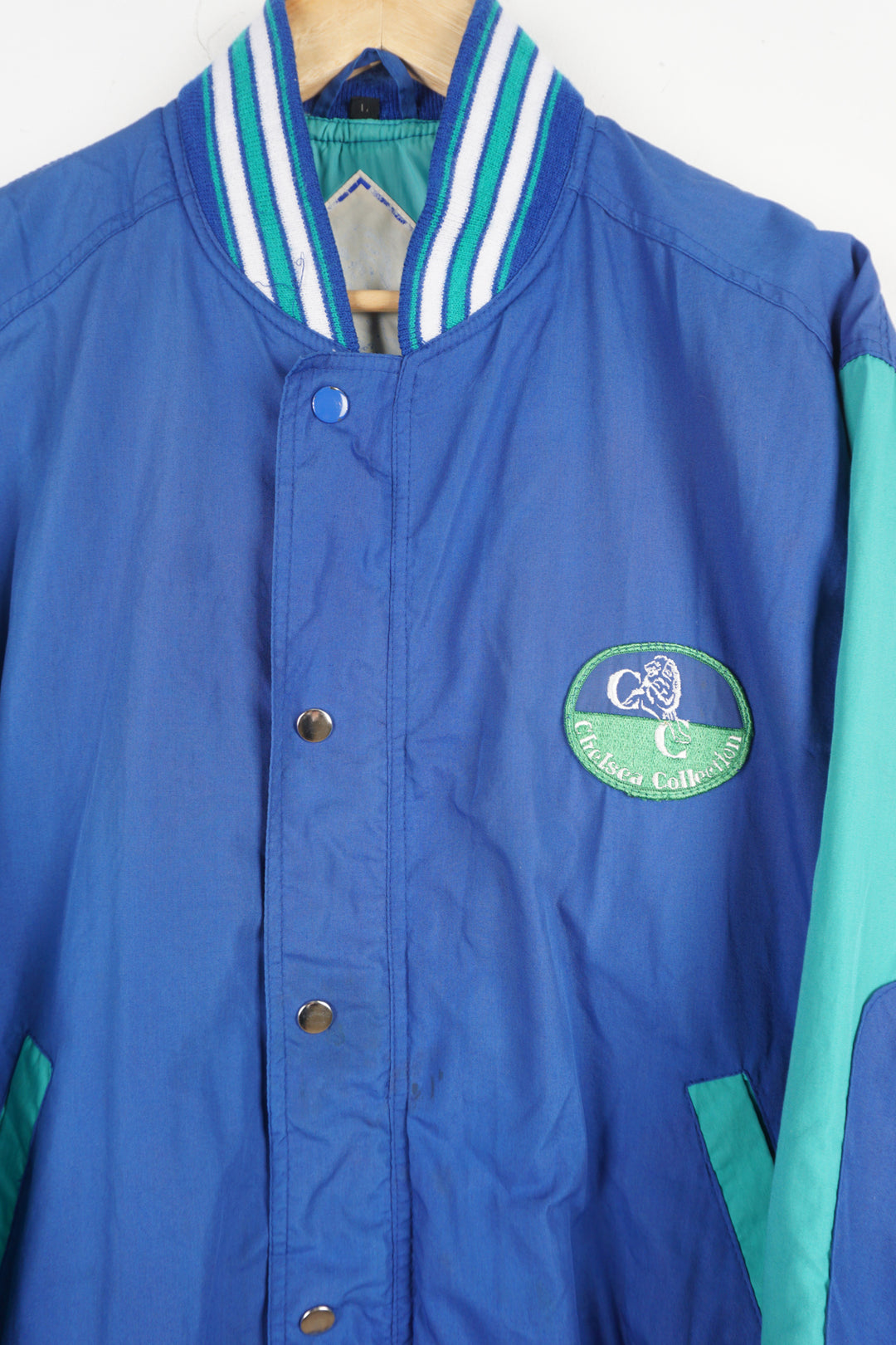 Vintage 1987-89 Chelsea Collection green and blue cotton bomber jacket with embroidered badge on the chest