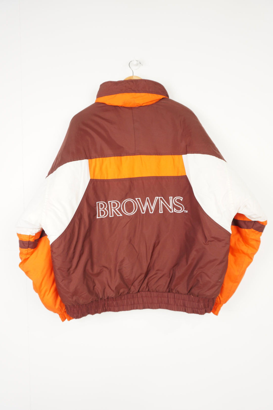 Vintage brown and orange Cleveland Browns NFL Gameday pro sport jacket with embroidered spell-out logos on the front and back