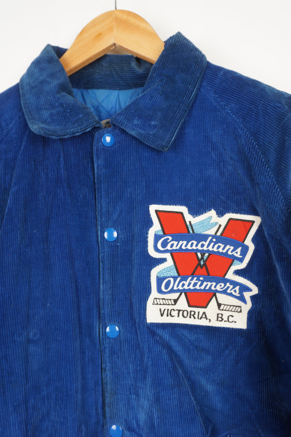 Vintage Victoria B.C 'Canadians Oldtimers' blue corduroy bomber jacket  features embroidered spell-out details on the chest