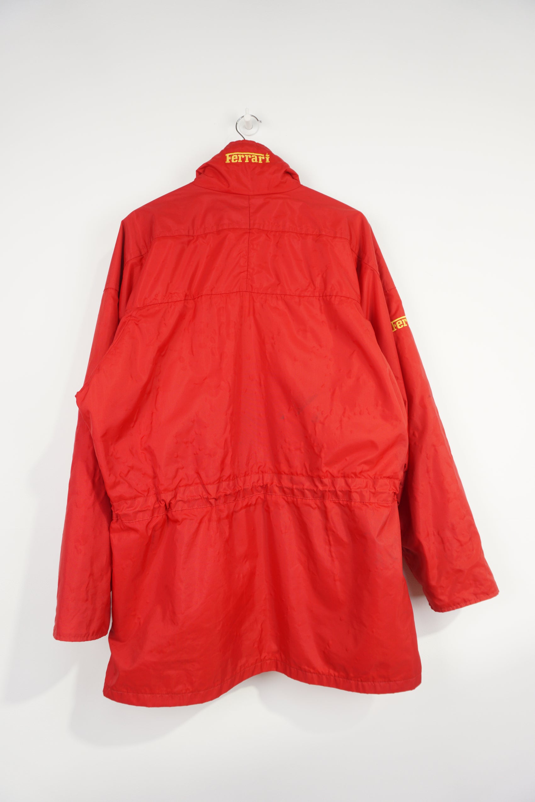 Rare vintage 1995 all red Ferrari zip through padded coat, features embroidered badge on the chest and collar