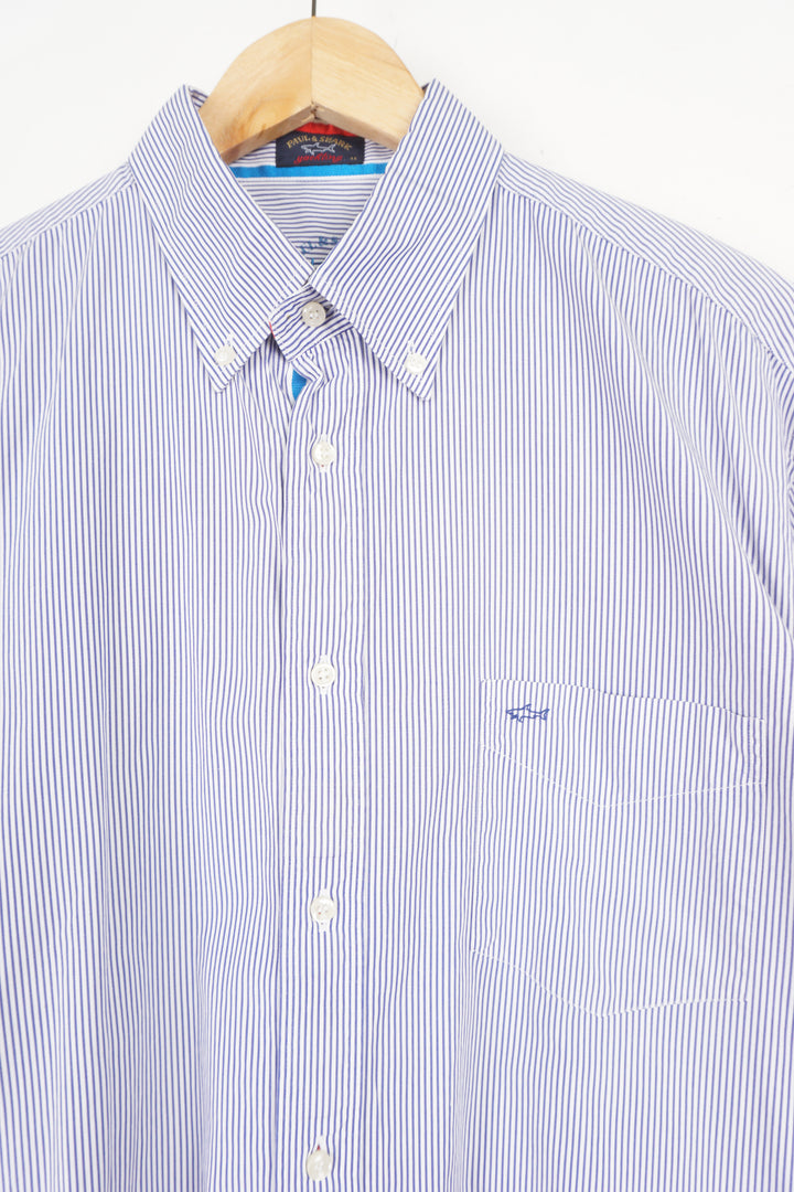 White and blue vertical striped shirt with embroidered Paul & Shark logo on the pocket