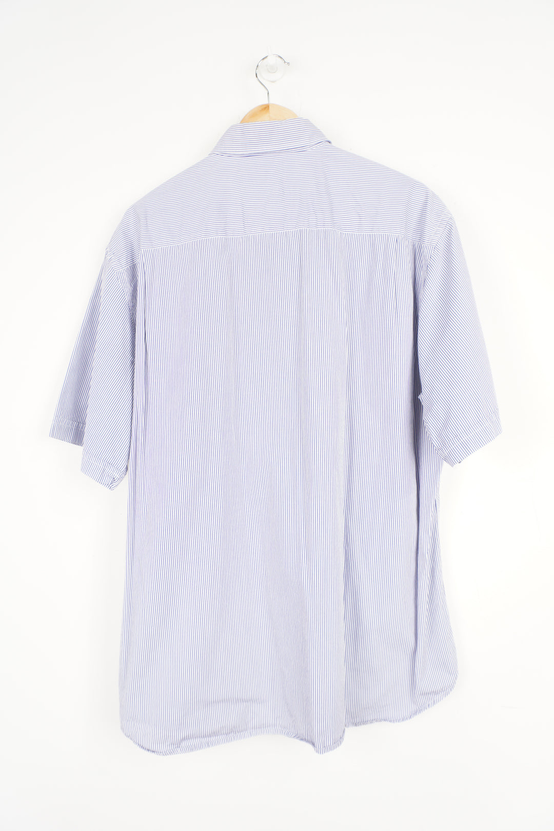 White and blue vertical striped shirt with embroidered Paul & Shark logo on the pocket