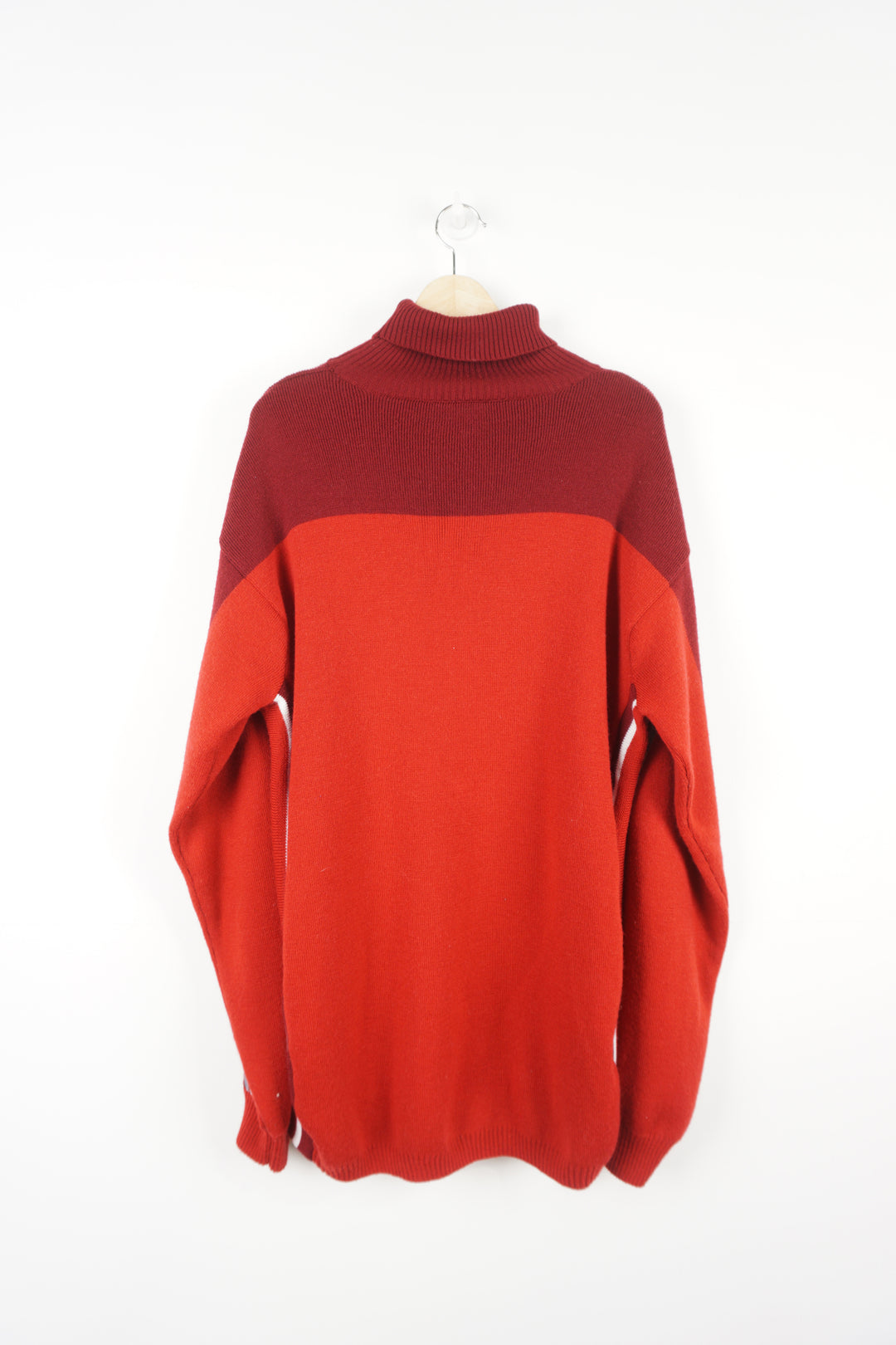 Nike SPRTSDLX red knitted jumper features raised logo on the chest