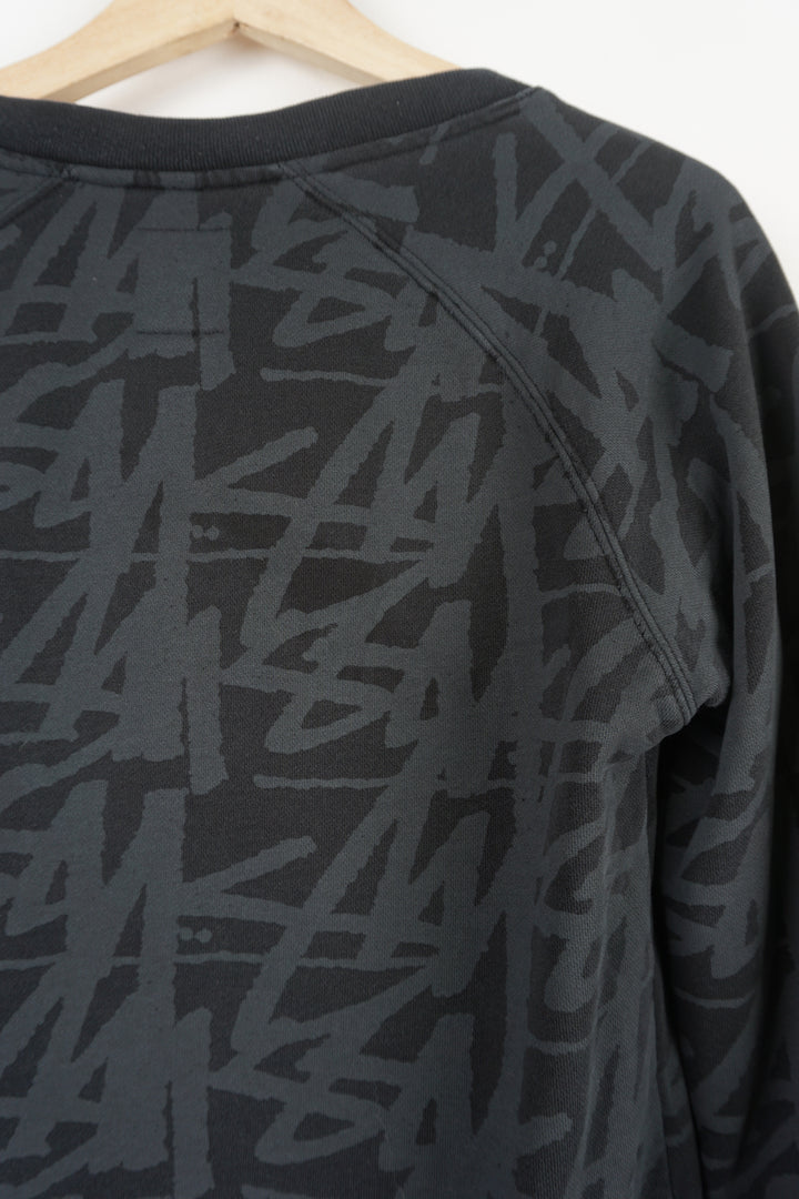 Stussy black v-neck sweatshirt with spell-out graphic all over