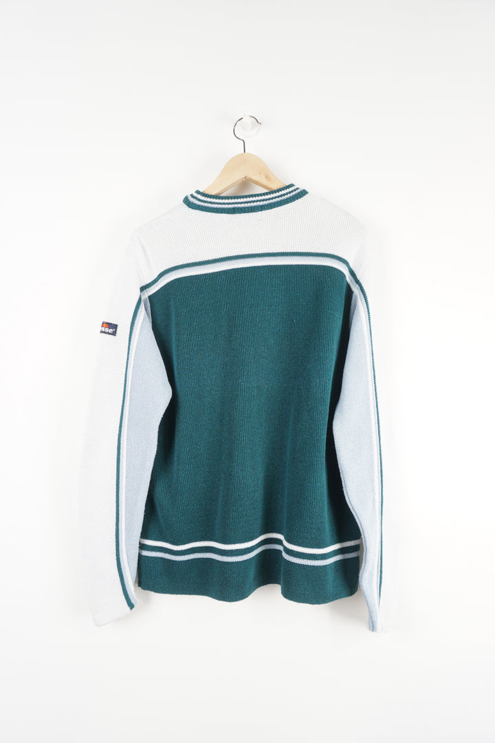 Vintage Ellesse teal blue and white knitted jumper, features  embroidered spell-out logo on the sleeve