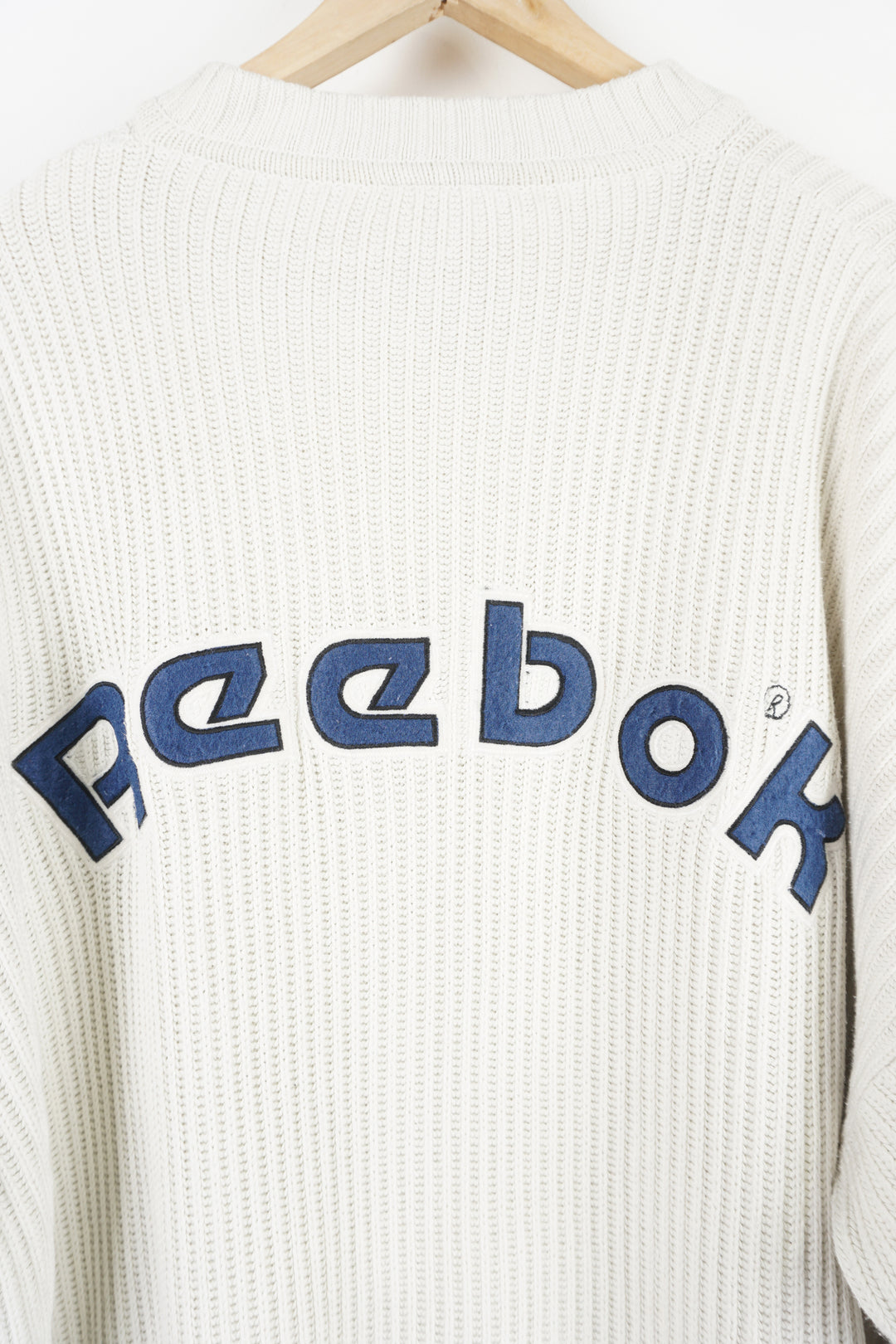 Reebok 1/4 zip v-neck cotton knit jumper features embroidered logo on the chest and spell-out details on the back