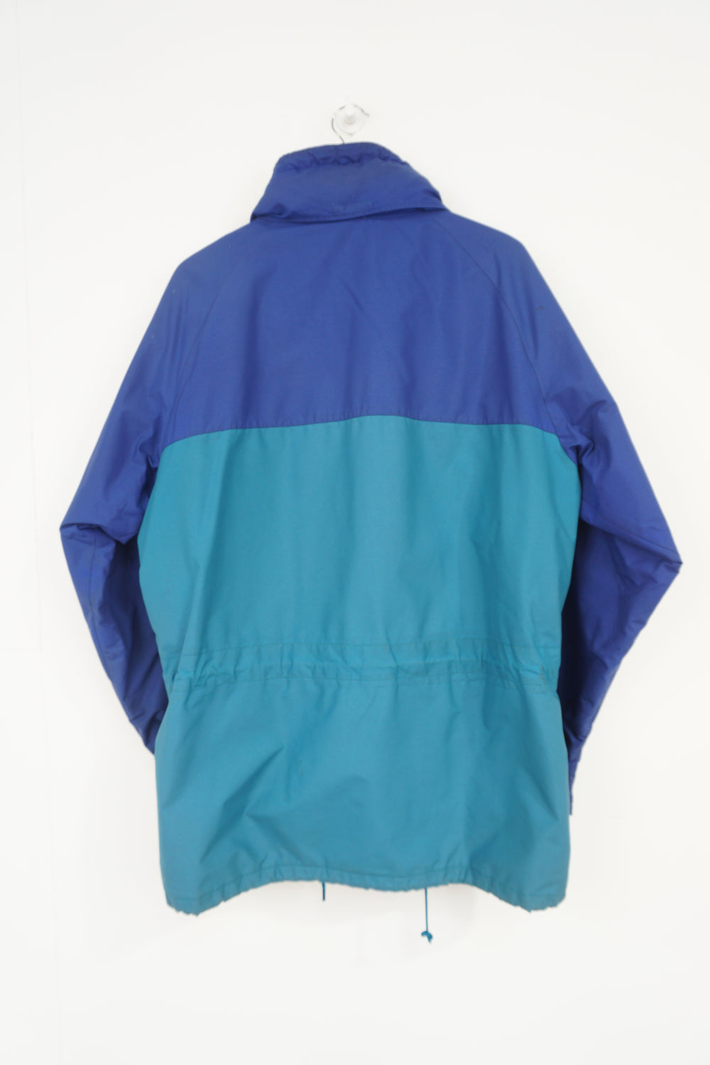 Berghaus blue gore-tex fabric Windbreaker jacket with foldaway hood and logo