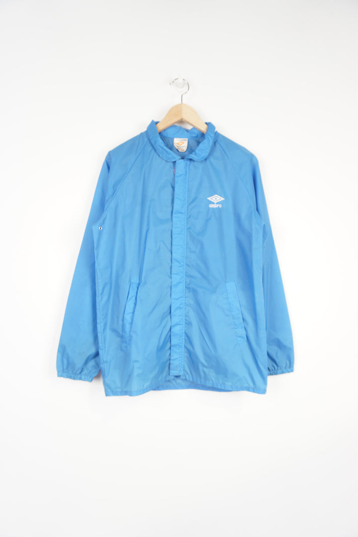 Vintage's Umbro blue tracksuit top with embroidered logo on the chest