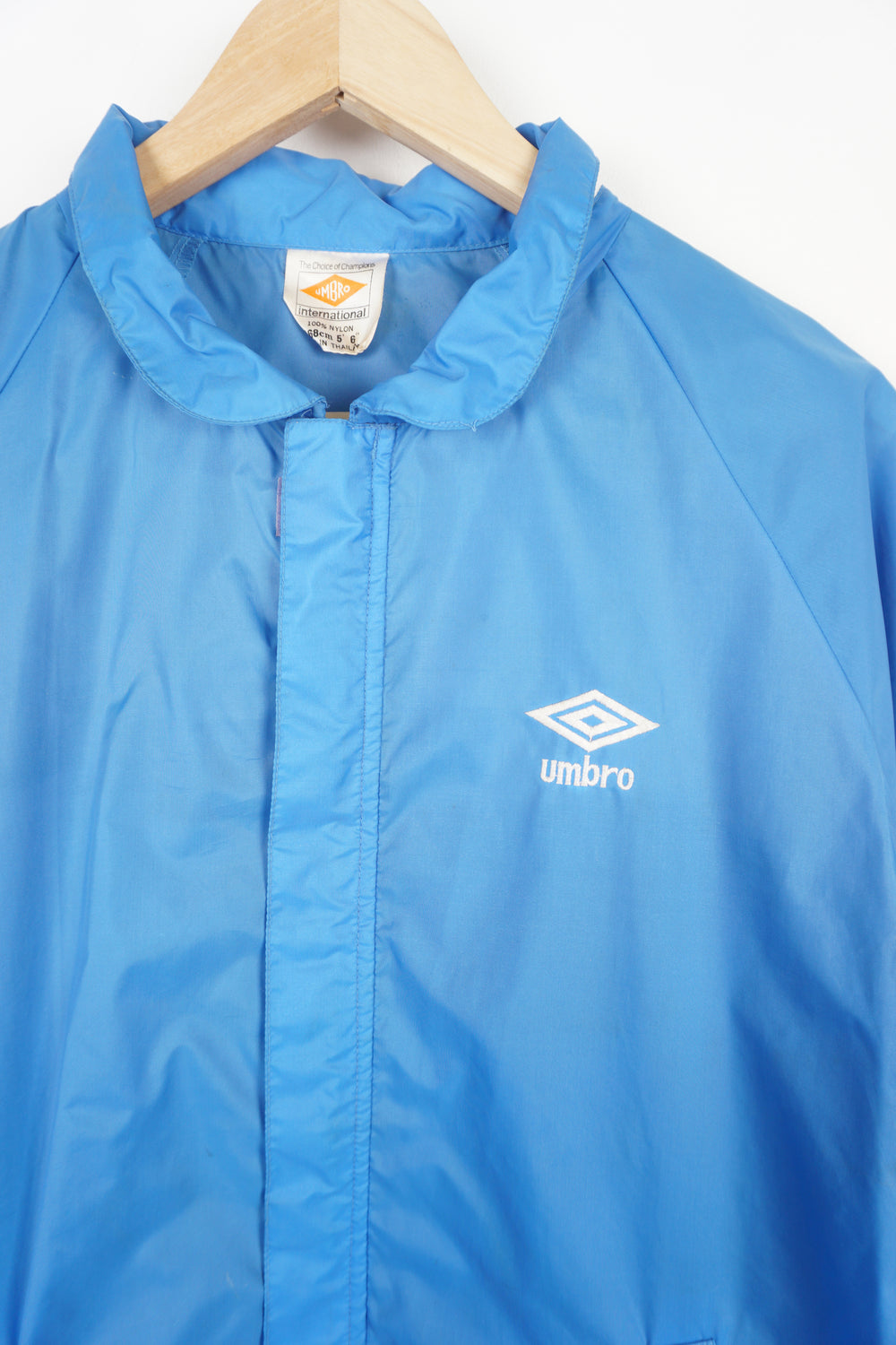 Vintage's Umbro blue tracksuit top with embroidered logo on the chest