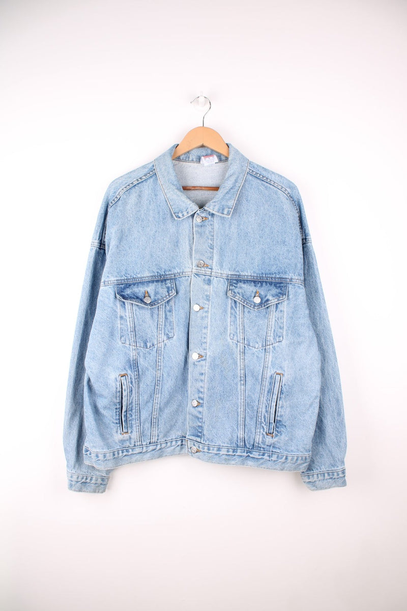 Vintage Coors Light Beer Denim Jacket in a blue colourway, button up with multiple pockets, and has 'Original Coors' spell out logo going across the back.