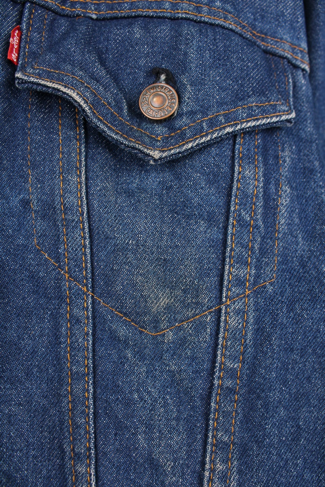 Levi's Denim Jacket in a blue colourway, button up with double chest pockets, has a blanket lining, and the logo embroidered on the front. 