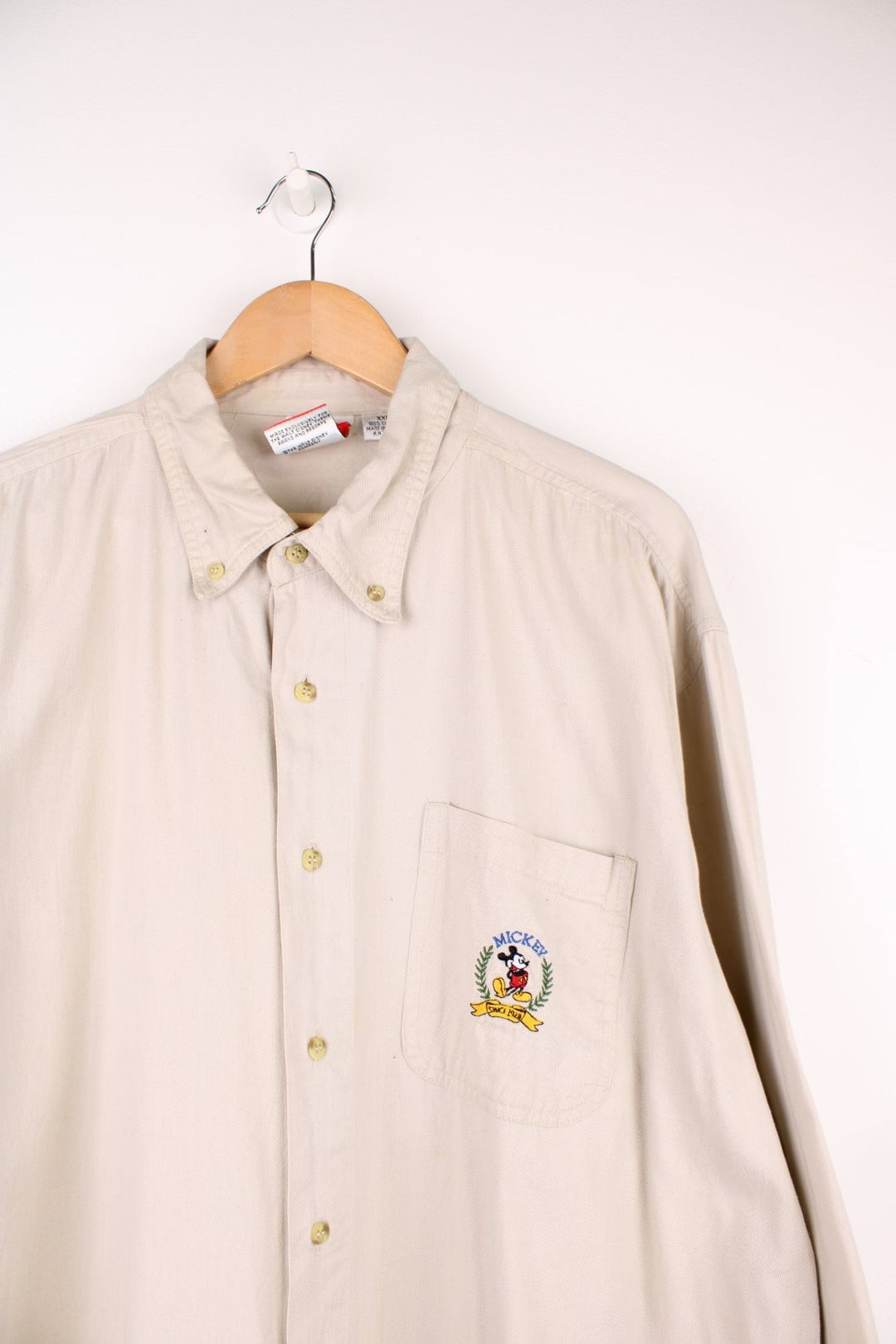 Disney Mickey Mouse Shirt in a tanned colourway, button up and has a chest pocket with Mickey Mouse embroiderd on. 